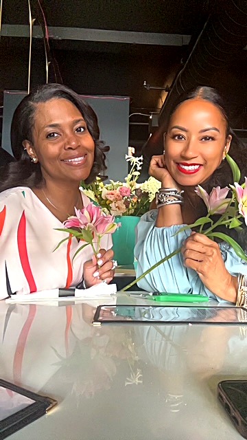 Happy customers with flowers